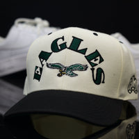 BOLD EAGLE$  - CRM/BLK (Green UV)